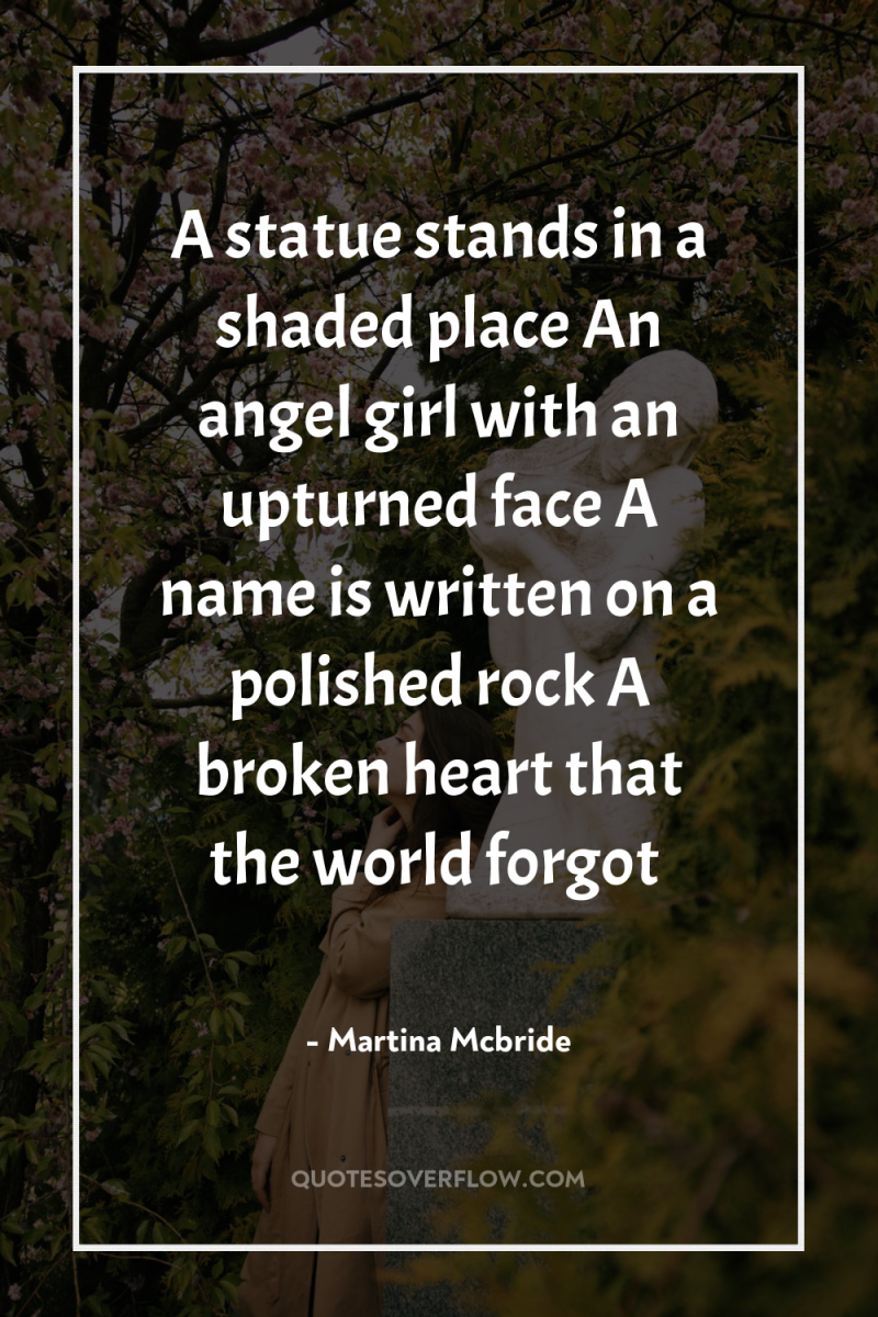 A statue stands in a shaded place An angel girl...