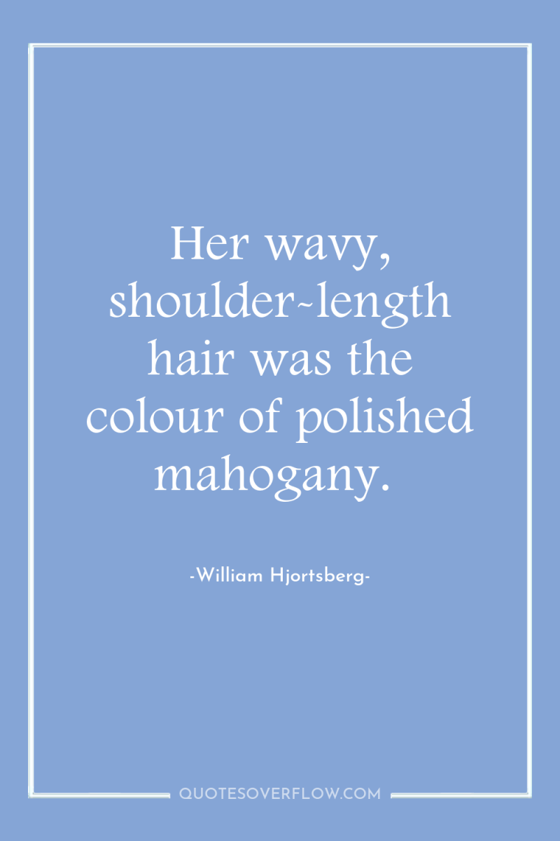 Her wavy, shoulder-length hair was the colour of polished mahogany. 