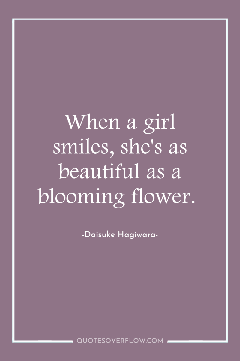 When a girl smiles, she's as beautiful as a blooming...